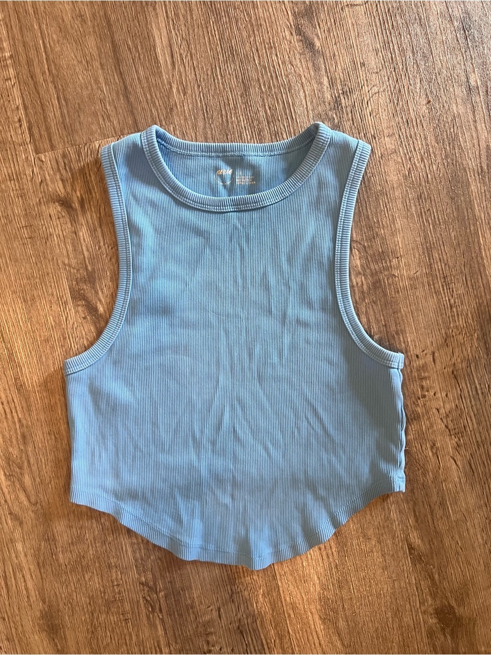 light blue Aerie ribbed cropped tank top featuring a hanky hem